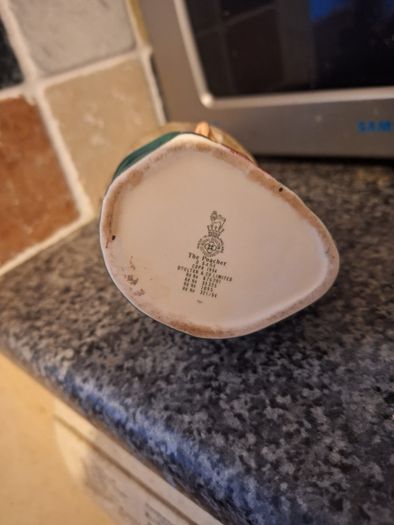 Vintage Royal Doulton "The Poacher" character piece