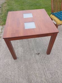 solid teak table and chairs