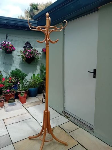 Wooden rotating coat stand