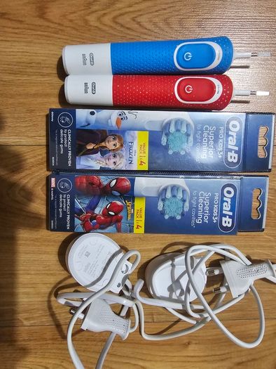 Oral b kids electric toothbrush x 2,brand new 8 heads and two charger