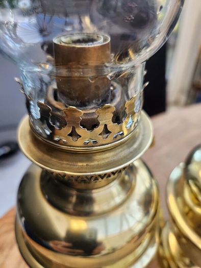 Matching pair of brass oil lamps.