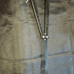 Black Steel Butterfly Comb designed for styling hair and beards