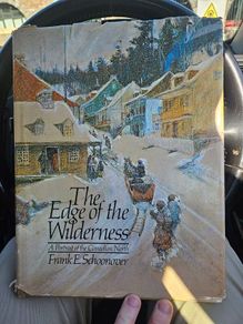 The Edge Of The Wilderness.  A Portrait Of North Canada. By Frank. E. Schoonover. First Edition 1974 Large Volume Hardback With Dustjacket In Good Condition.  See Photos For Same.