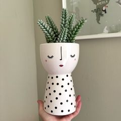 artificial plant in ceramic pot