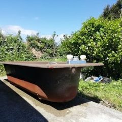 Cast iron brown bath with fittings, brown Royal Dalton toilet and cistern, brown wash hand basin with taps.