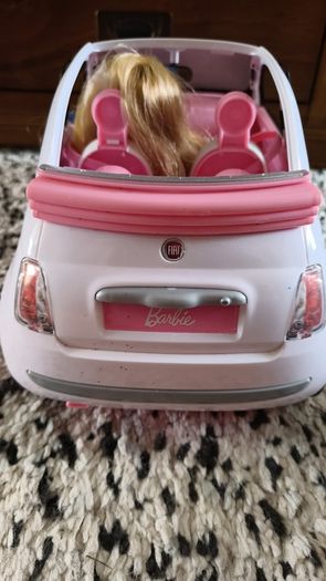 Barbie with car.