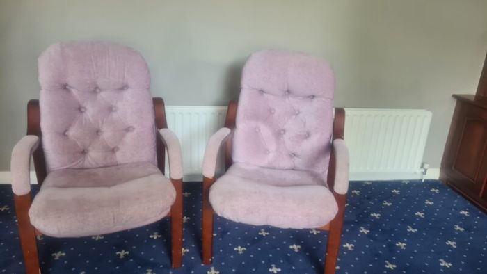 Two High Backed fireside Chairs