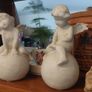 Lovely Vintage Pair of Ceramic Baby Winged Angels Sitting on Globes with a Very Tactile Cream Coloured Crackle Glaze Image 4
