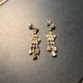 silver drop earrings with white stones Image 2