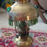 Antique petit brass oil lamp with green beaded garland Image 4