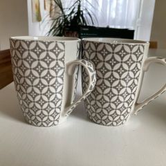 Pair of Newgrange Living mugs