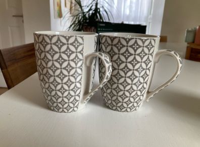 Pair of Newgrange Living mugs