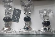 Newgrange candle holders .New in box black and glass .Would make a lovely gift