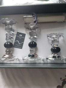Newgrange candle holders .New in box black and glass .Would make a lovely gift