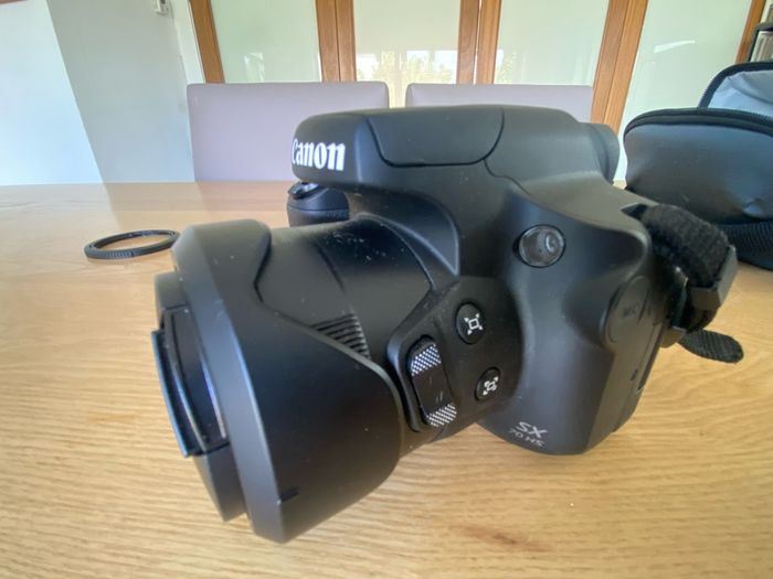 Canon Powershot SX70 HS + Canon accessories.