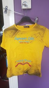 New yellow  t shirt size 6/7 years old