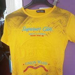 New yellow  t shirt size 6/7 years old