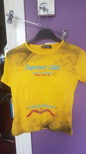 New yellow  t shirt size 6/7 years old
