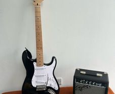 Squire Stratocaster electric guitar and Amp