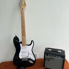 Squire Stratocaster electric guitar and Amp