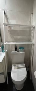 White wooden bathroom storage unit