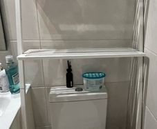 White wooden bathroom storage unit