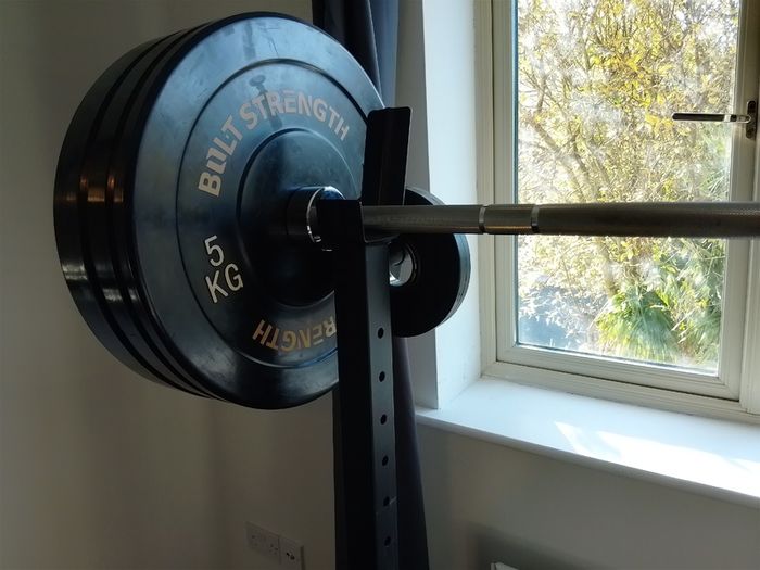 155kg Bumper Plate Set 7ft Olympic Bar and adjustable Squat Stands.