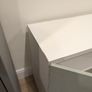 White TV unit with grey-green doors Image 4
