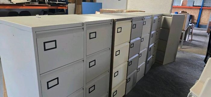 40 second-hand 4 drawer filing cabinets.