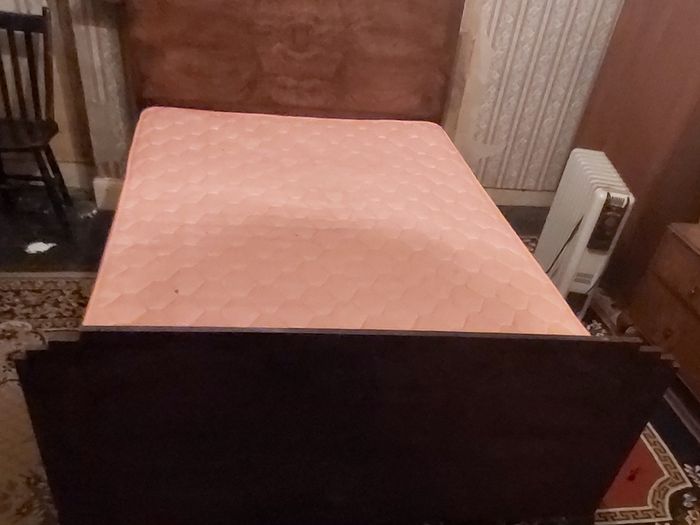 A Wooden Metal Framed Double Bed