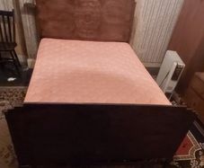 A Wooden Metal Framed Double Bed