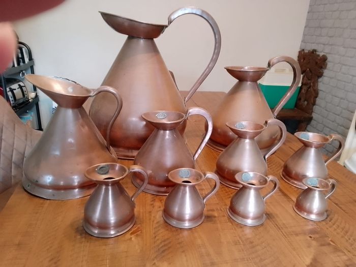 vintage copper measure jug collection