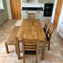 Solid Oak dining table and chairs Image 3