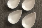 4 tear shaped dishes.