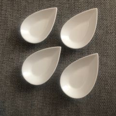 4 tear shaped dishes.