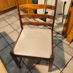 Dining table with glass top and four chairs