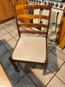 Dining table with glass top and four chairs