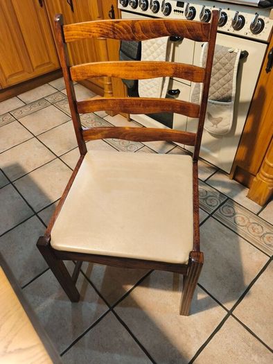 Dining table with glass top and four chairs