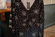New look black Dress with white star pattern and v neck. New with tags.