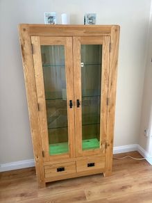 Living room Tall oak side board 2 glass doors and 2 drawers with lights,