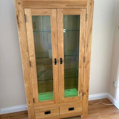 Living room Tall oak side board 2 glass doors and 2 drawers with lights,
