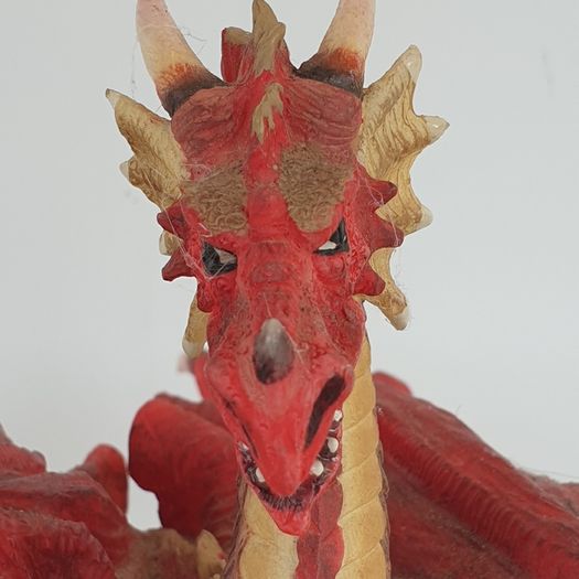 Red dragon figure on rock ceramic 19 cm high