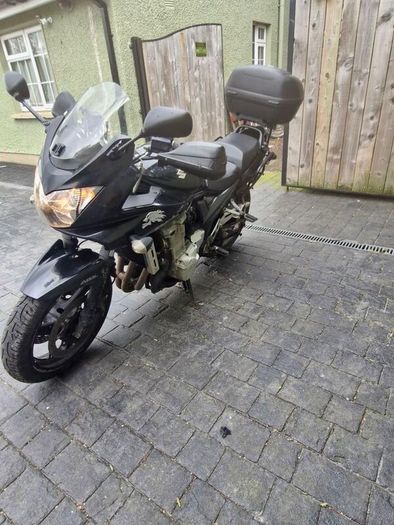 2007 black susuki bandit 1250 including luggage boxes .
