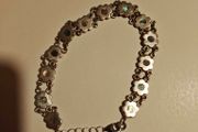 silver bracelet with mother of pearl in little flowers