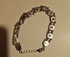 silver bracelet with mother of pearl in little flowers