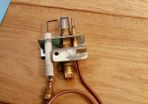gas fire pilot and and thermal coupling.
