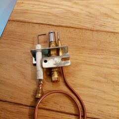 gas fire pilot and and thermal coupling.