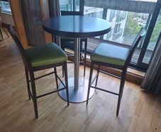 high bar table with three chairs