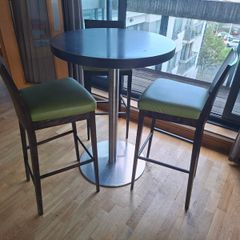 high bar table with three chairs