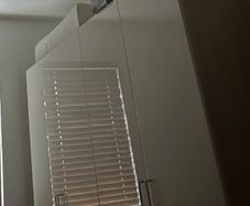 Two gloss white IKEA Pax Wardrobes